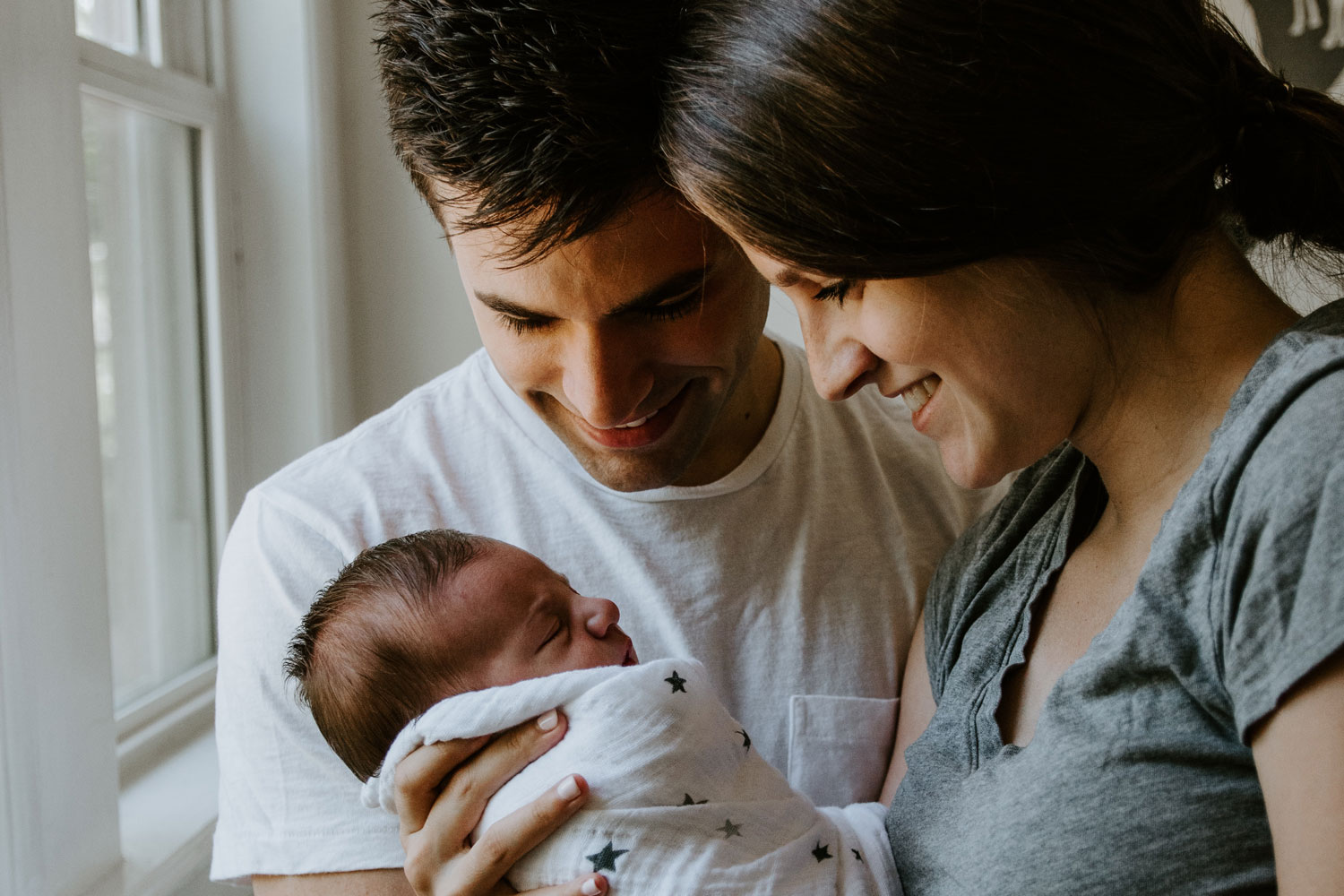 image of a family with an infant child